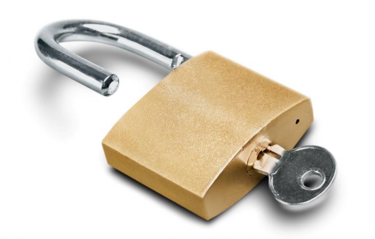 tiny little hole at the bottom of a padlock