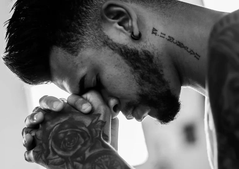 Tattoo behind Man Ear