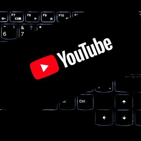 Youtube logo on a backlit keyboard.