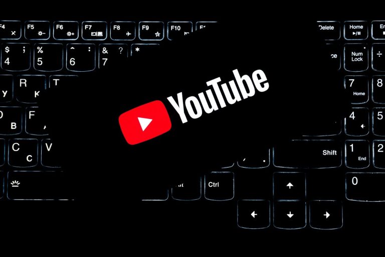 Youtube logo on a backlit keyboard.