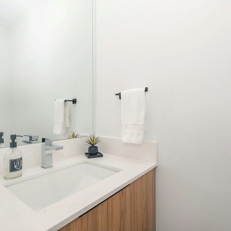 white ceramic sink with faucet