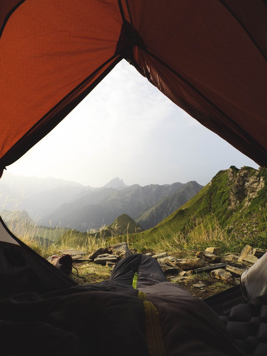 a view from inside a tent of a mountain range
