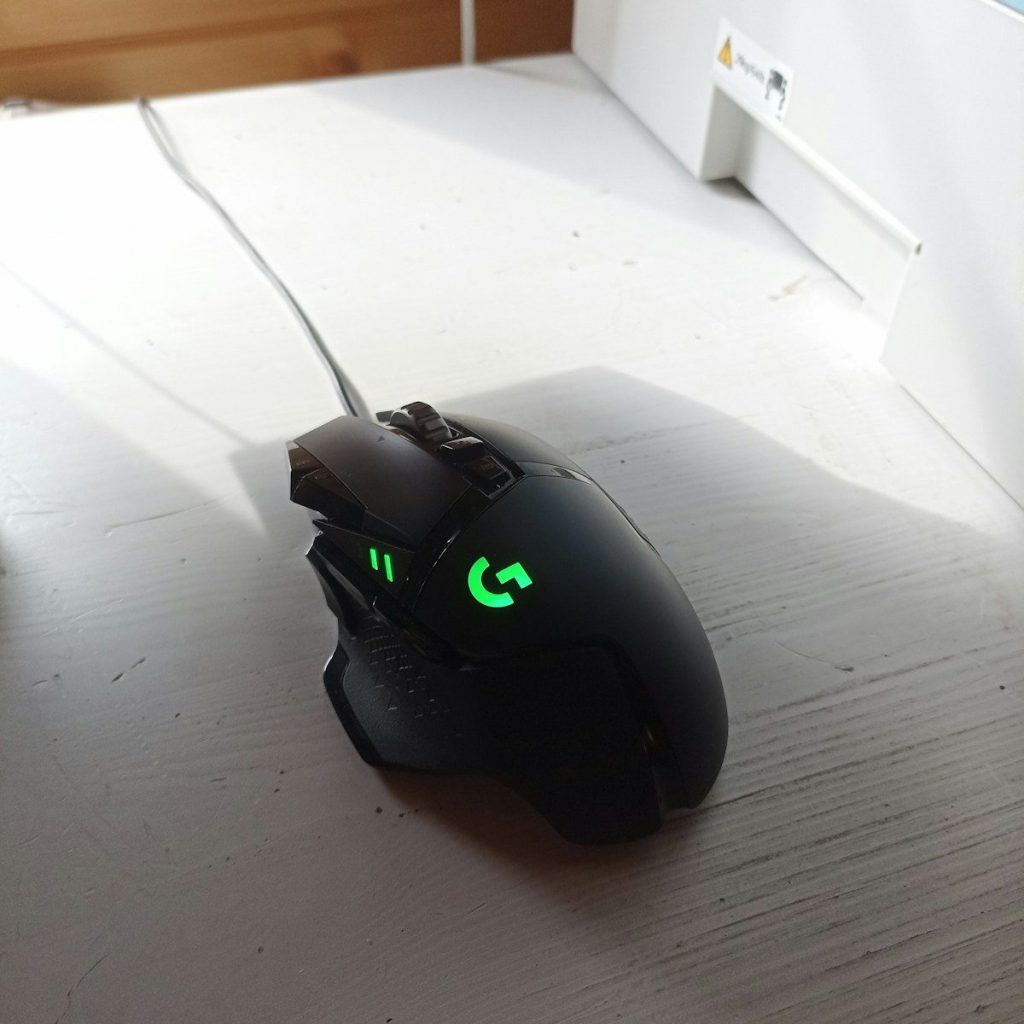 a computer mouse sitting on top of a desk
