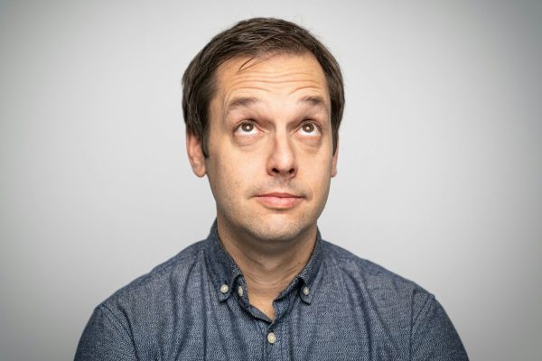 a man with a surprised look on his face