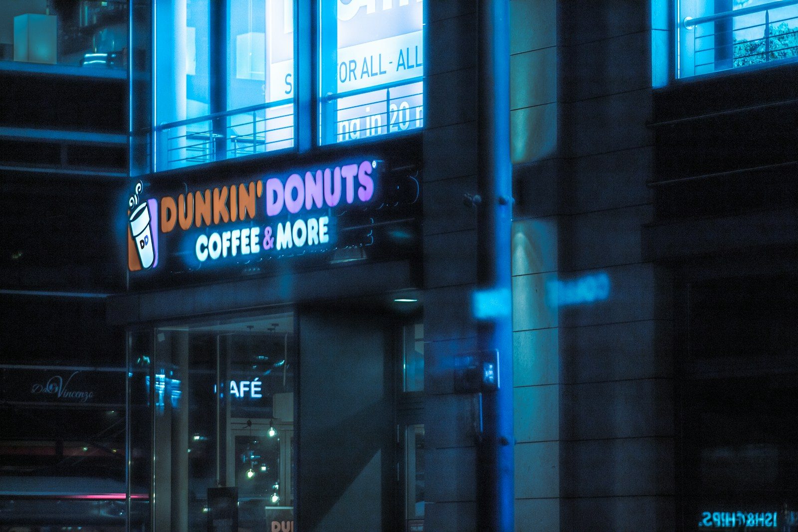 a dunkin'donuts coffee store at night