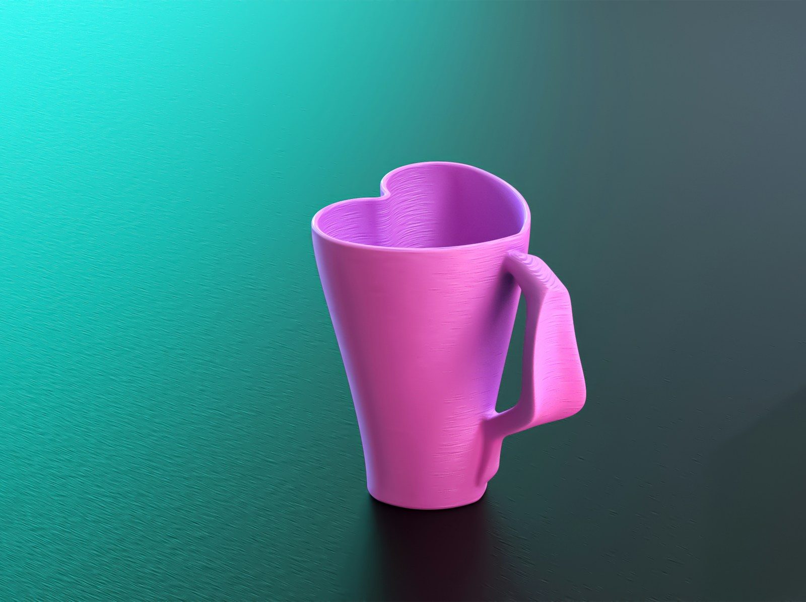 A pink coffee cup sitting on top of a table