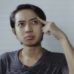 woman in gray crew neck shirt